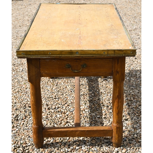 315 - A Victorian pine scullery table with brass mounted overlaid top and drawer to each end, raised on tu... 