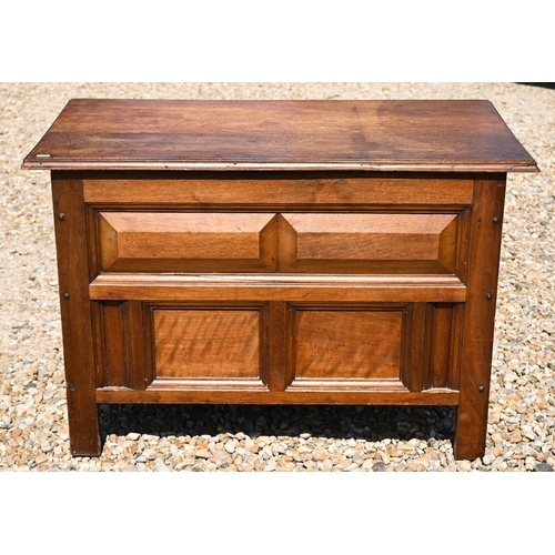 316 - A stained hardwood blanket chest of panelled construction with hinged top, 92 cm wide x 50 cm deep x... 