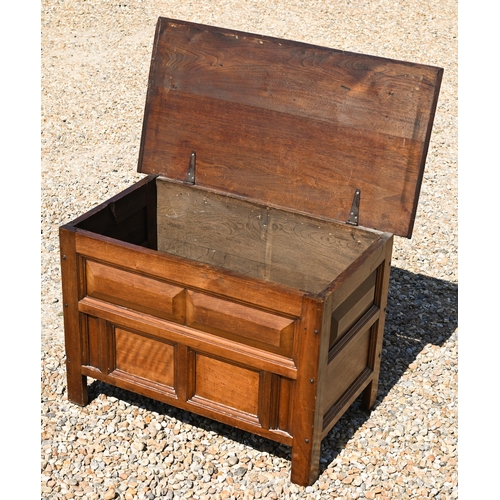 316 - A stained hardwood blanket chest of panelled construction with hinged top, 92 cm wide x 50 cm deep x... 