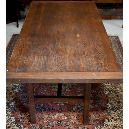 319 - A substantial elm and oak dining table with cleated rectangular top on square supports unted by stre... 