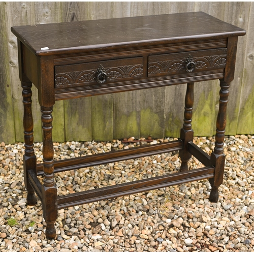 324 - # A stained elm two drawer hall table on turned supports with stretchers 80 cm x 32 cm x 74 cm h