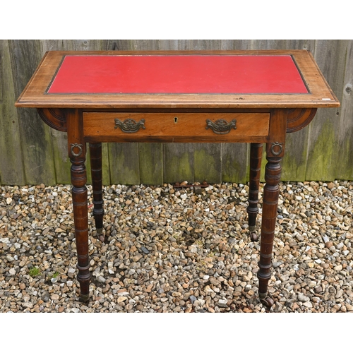 329 - A late 19th century single door oak desk, with red leather panelled top and raised on turned legs to... 