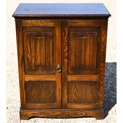 330 - # Jaycee Furniture, an oak linenfold moulded media  cabinet, 78 cm x 45 cm