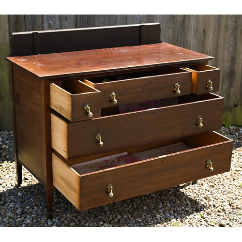 334 - # An Edwardian walnut five drawer chest raised on short square section legs to brass castors, 107 cm... 