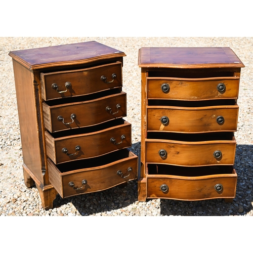 335 - Two differing reproduction bow-fronted bedside four drawer chests, raised on shaped bracket feet, 49... 