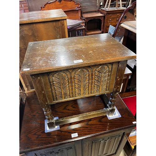 337 - A 17th century style carved oak box raised on bobbin turned supports untied by stretchers, 51 cm x 3... 