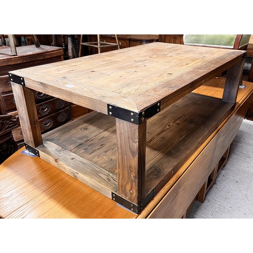 343 - # A rustic steel bound reclaimed pine two-tier coffee table, 120 cm x 70 cm x 40 cm h