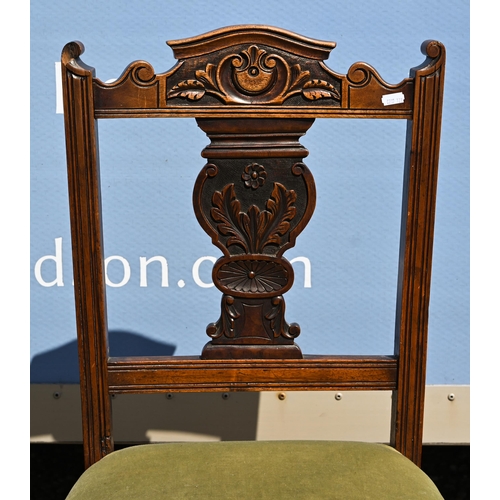 345 - # A set of four late 19th century overstuffed carved and moulded walnut framed side chairs (4)