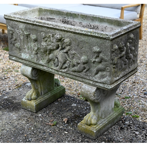 4 - A weathered regency style cast stone trough planter, raised on twin trestle ends, 87 cm x 35 cm x 69... 