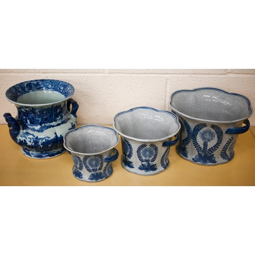 405 - A graduated set of three blue and white ceramic cache-pots to/w a jardiniere and a pie-dish and cove... 