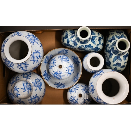 406 - A pair of modern Chinese blue and white moon flasks, decorated with butterflies to/w a suite of six ... 