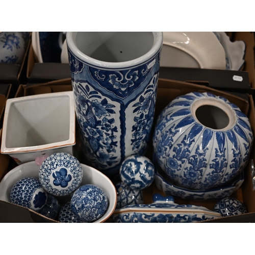 409 - A blue and white pottery stick stand, to/w nine carpet-bowls, a tureen and cover and four vases and ... 