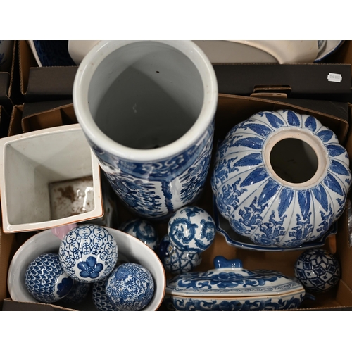 409 - A blue and white pottery stick stand, to/w nine carpet-bowls, a tureen and cover and four vases and ... 