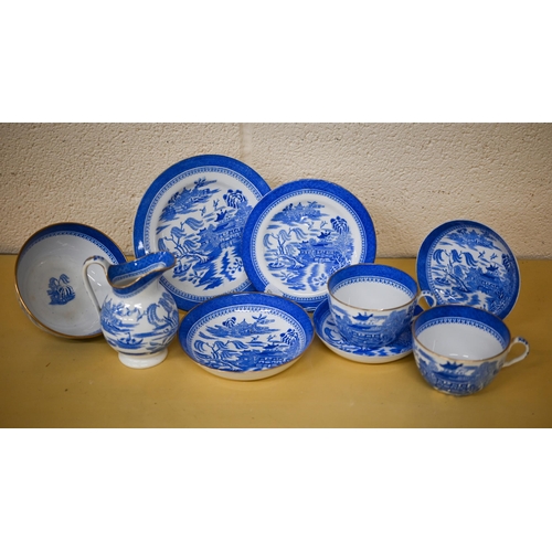 411 - A Spodes Copeland china Willow pattern part tea set to/w four stoneware hot water bottles - one stam... 