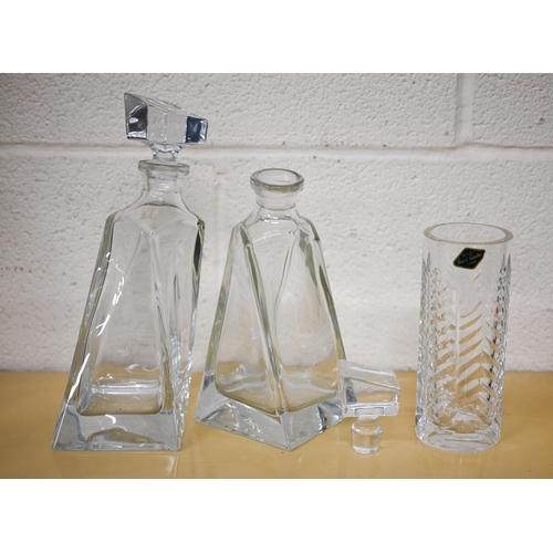 433 - A boxed Waterford 'Accent Carafe' from the Elegance Collection to/w a pair of modern design decanter... 