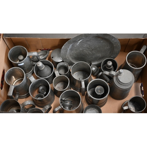 483 - A quantity of 19th century and later pewter tankards, measures, a plate to/w various copper jugs, br... 