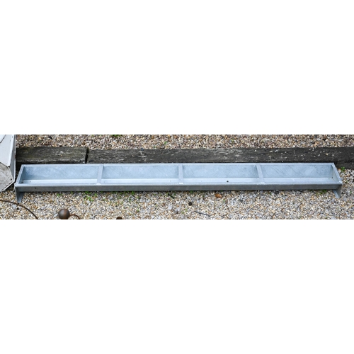 57 - An IAE galvanised metal floor feeding cattle trough planter, 274 cm/ 9 ft long