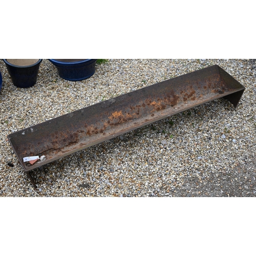 60 - An antique cast iron feeding trough planter, 150 cm