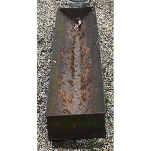 60 - An antique cast iron feeding trough planter, 150 cm