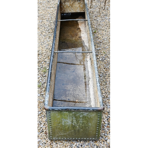 61 - A large galvanised and riveted agricultural water trough planter, 308 cm x 50 cm x 50 cm o/a