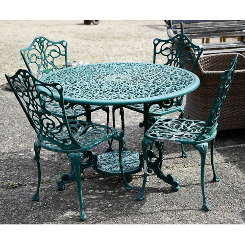 62 - A Victorian style green painted cast alloy terrace set comprising four chairs and a circular table (... 