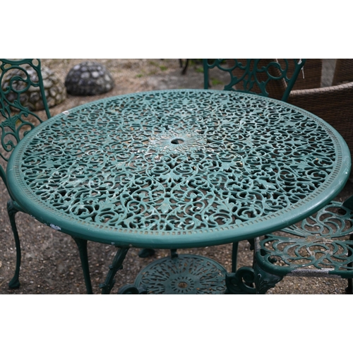 62 - A Victorian style green painted cast alloy terrace set comprising four chairs and a circular table (... 