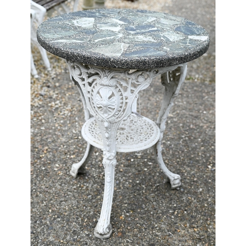 63 - A circular Victorian style cast alloy terrace table with composite marble top