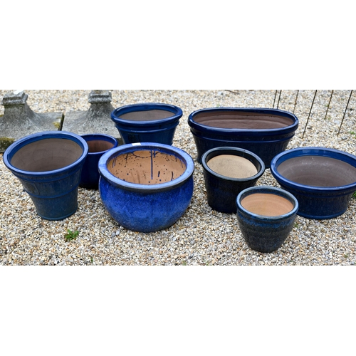 64 - An assortment of eight blue glazed garden planters (8)