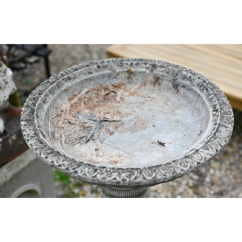 67 - A weathered cast stone birdbath, 76 cm h