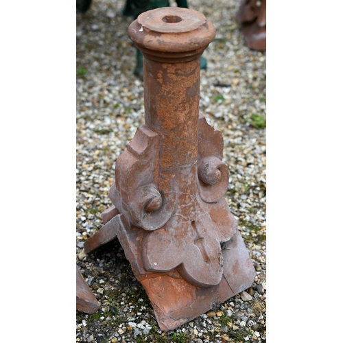 70 - A pair of old weathered terracotta finial ridge tiles, by Blanchard & Co, 46 cm h (2)