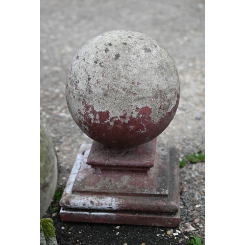 76 - A trio of weathered cast stone ball finials and bases, sizes and designs differ (3)