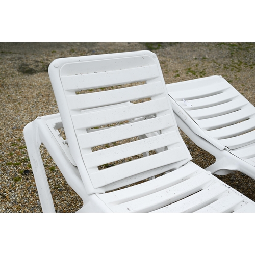 78 - A pair of Balliu poolside or garden stackable sun loungers with adjustable back rests, 190 cm x 70 c... 