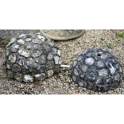 79 - A pair of flint encrusted domes or planters to/with a three piece composite birdbath, all a/f