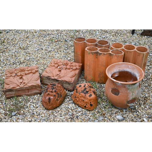 86 - A trio of hexagonal terracotta triple bricks to/with a pair of decorative Arts & Crafts style wa... 