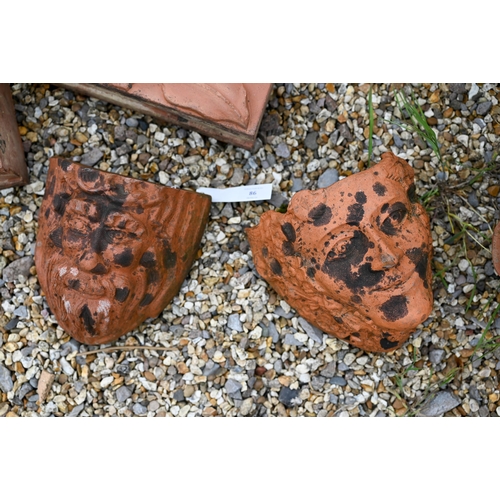 86 - A trio of hexagonal terracotta triple bricks to/with a pair of decorative Arts & Crafts style wa... 