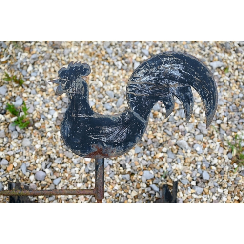 90 - A steel cockerel surmounted wind vane to/with a cast iron 'cat' doorstop (2)