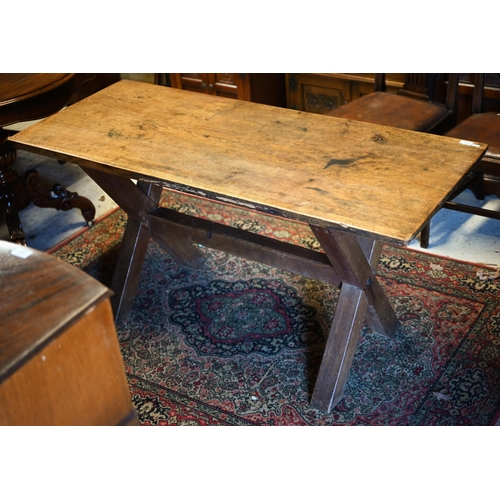 114 - An old oak 'X' frame dining table with high level centre stretcher, 145 cm x 60 cm x 72 cm h