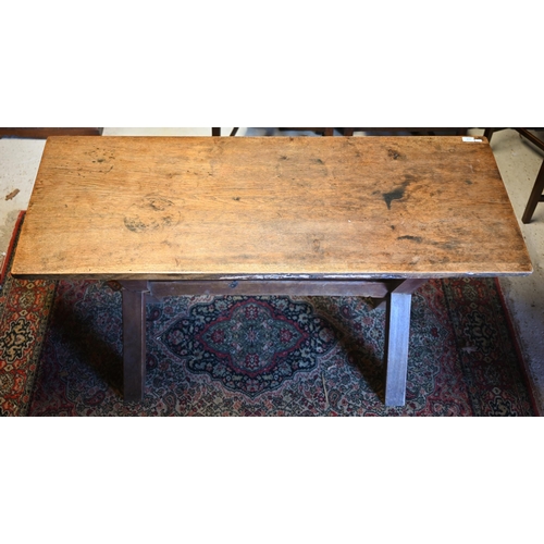 114 - An old oak 'X' frame dining table with high level centre stretcher, 145 cm x 60 cm x 72 cm h