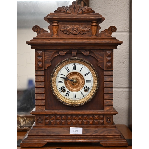 159 - A late 19th century Ansonia Suvia (New York) eight day mantel clock, c/w pendulum and key, 44 cm hig... 