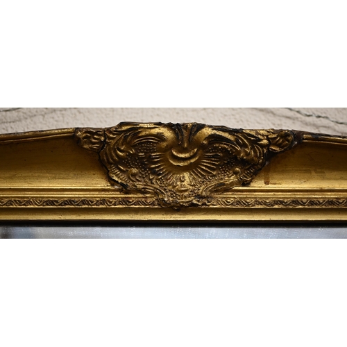 240 - A bevelled rectangular wall mirror in decorative giltwood and gesso frame, 104 x 78 cm a/f