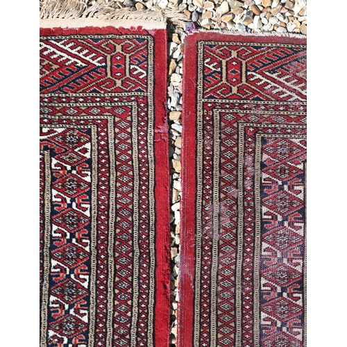 286 - Pair of Pakistani Turkoman red ground rugs, both 186 x 128 cm (2)