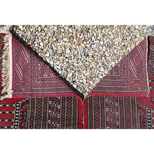 286 - Pair of Pakistani Turkoman red ground rugs, both 186 x 128 cm (2)