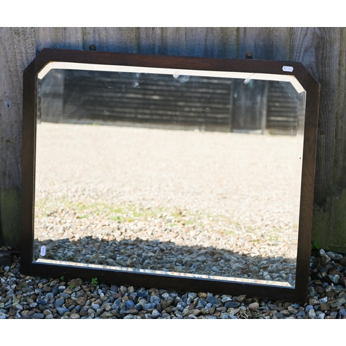 301 - # Three various bevelled wall mirrors in stained oak frames