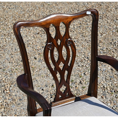 311 - A set of eight Chippendale style mahogany dining chairs with cream pads by Stephen Thorne (2 carvers... 