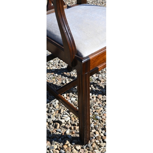 311 - A set of eight Chippendale style mahogany dining chairs with cream pads by Stephen Thorne (2 carvers... 