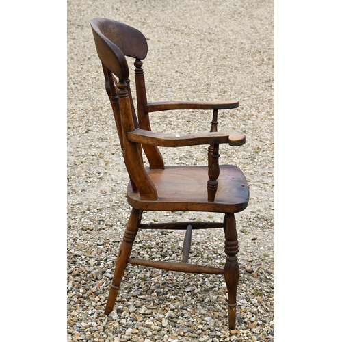 318 - A beech and elm elbow chair to/w a rush-seated elbow chair (2)