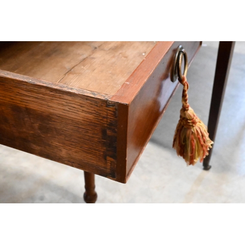 349 - # A 19th century mahogany drop leaf side table with drawer to one end and dummy to other, raised on ... 