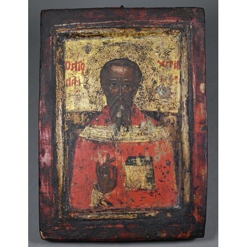 399 - An antique Greek Orthodox polychrome and gilt icon, 24 x 17 cm