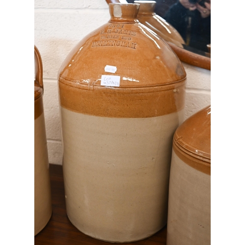 437A - A large 6-gallon stoneware flagon stamped for E H James of Birmingham, a Doulton Lambeth flagon and ... 