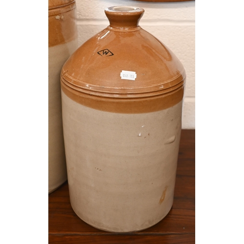 437A - A large 6-gallon stoneware flagon stamped for E H James of Birmingham, a Doulton Lambeth flagon and ... 